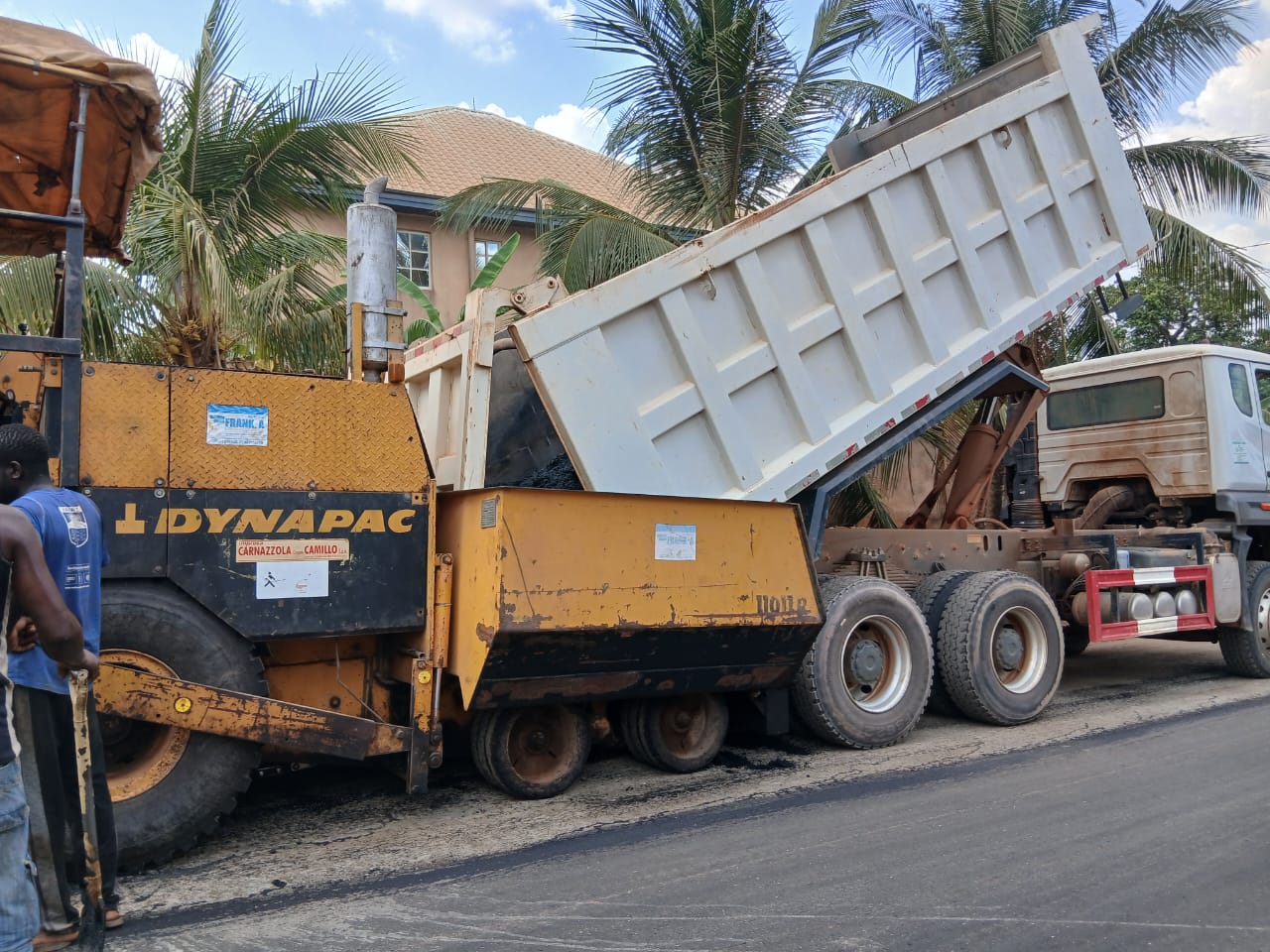 Offloading of Asphalt on paver for road pavement